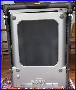 A very lightly used Dynamax RunningPad folding treadmill (Model DYCV-10221)